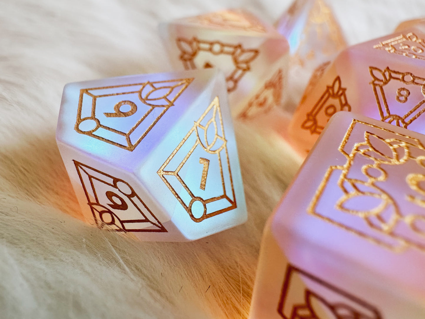 a stained glass pattern on rainbow glass dice
